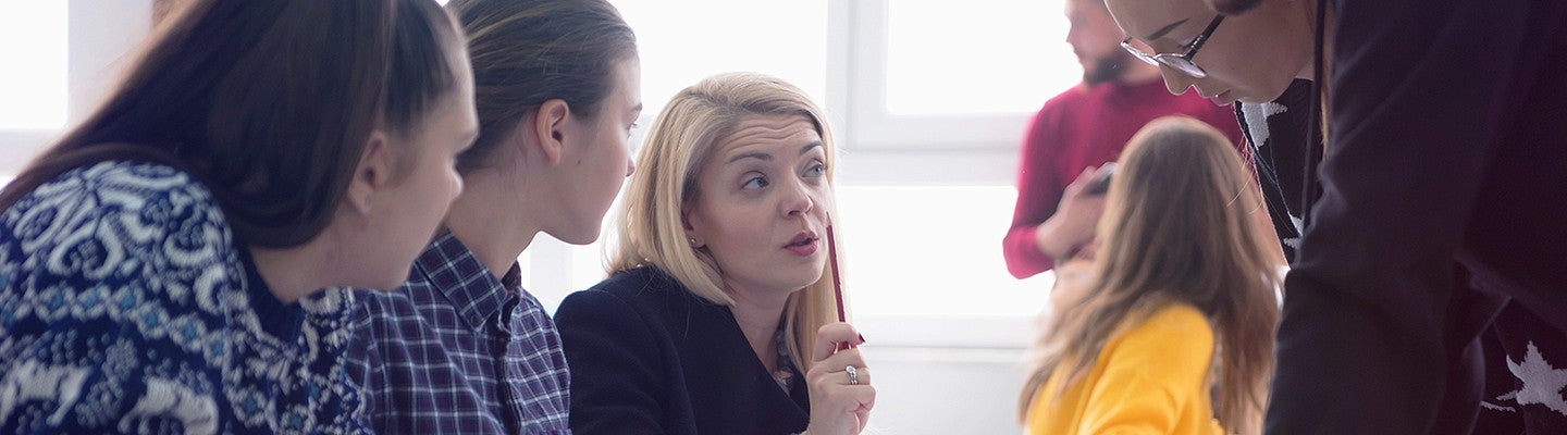 teachers talking during a meeting