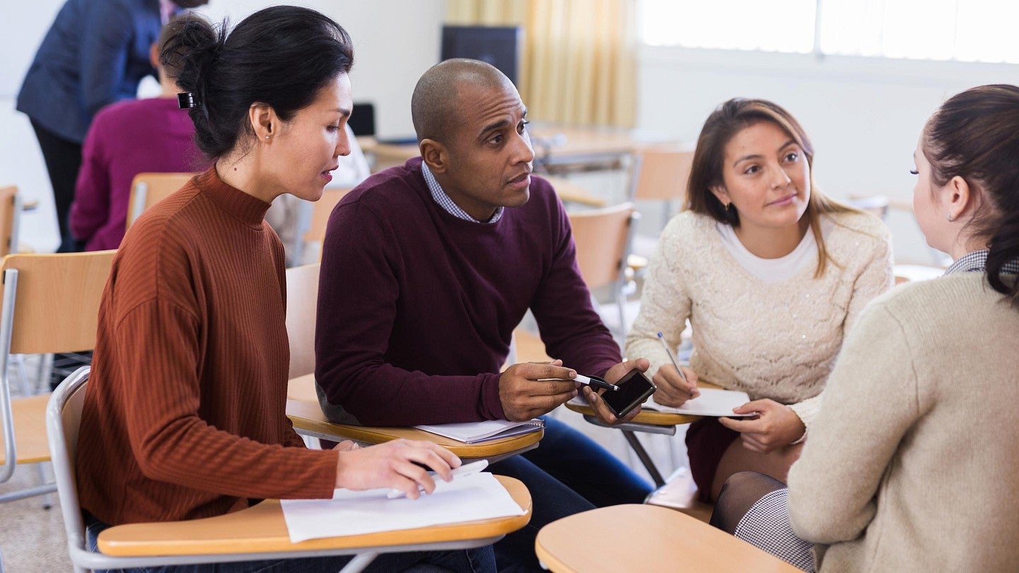 teachers discussing in a group