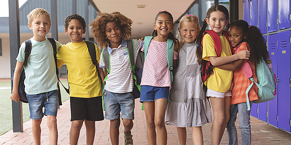 school kids smiling together 