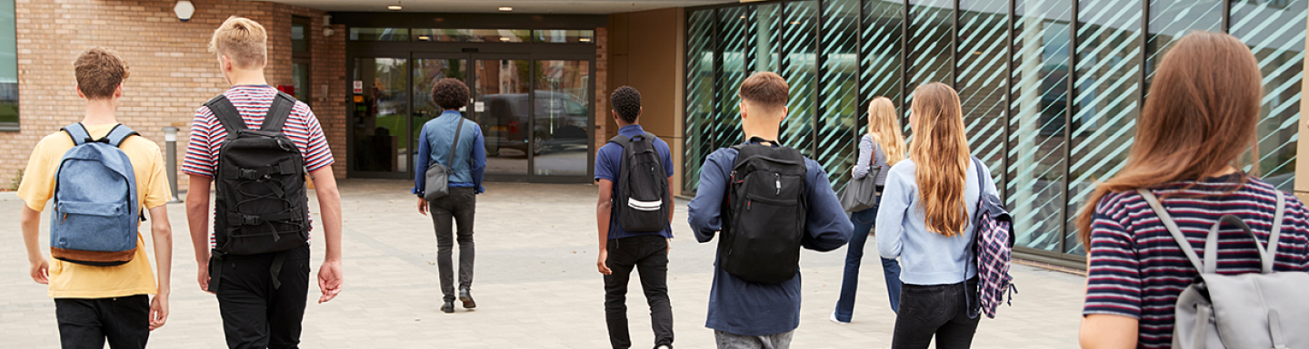 students walking into high school