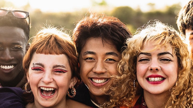 a group of teenagers smiling together